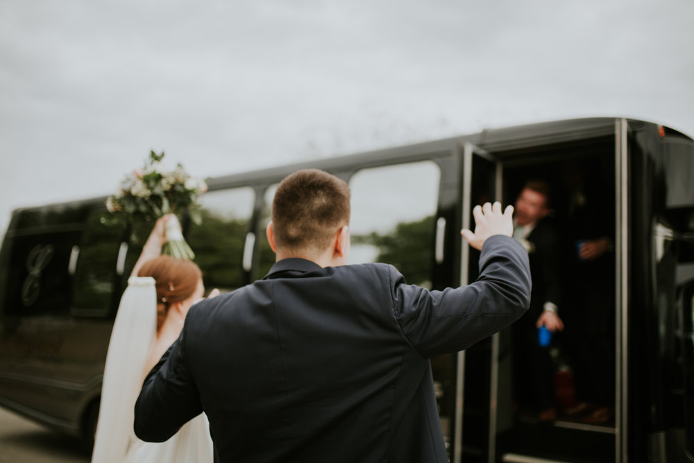 Married Couple getting on a bus